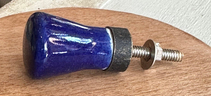 kastknoop porselein blauw